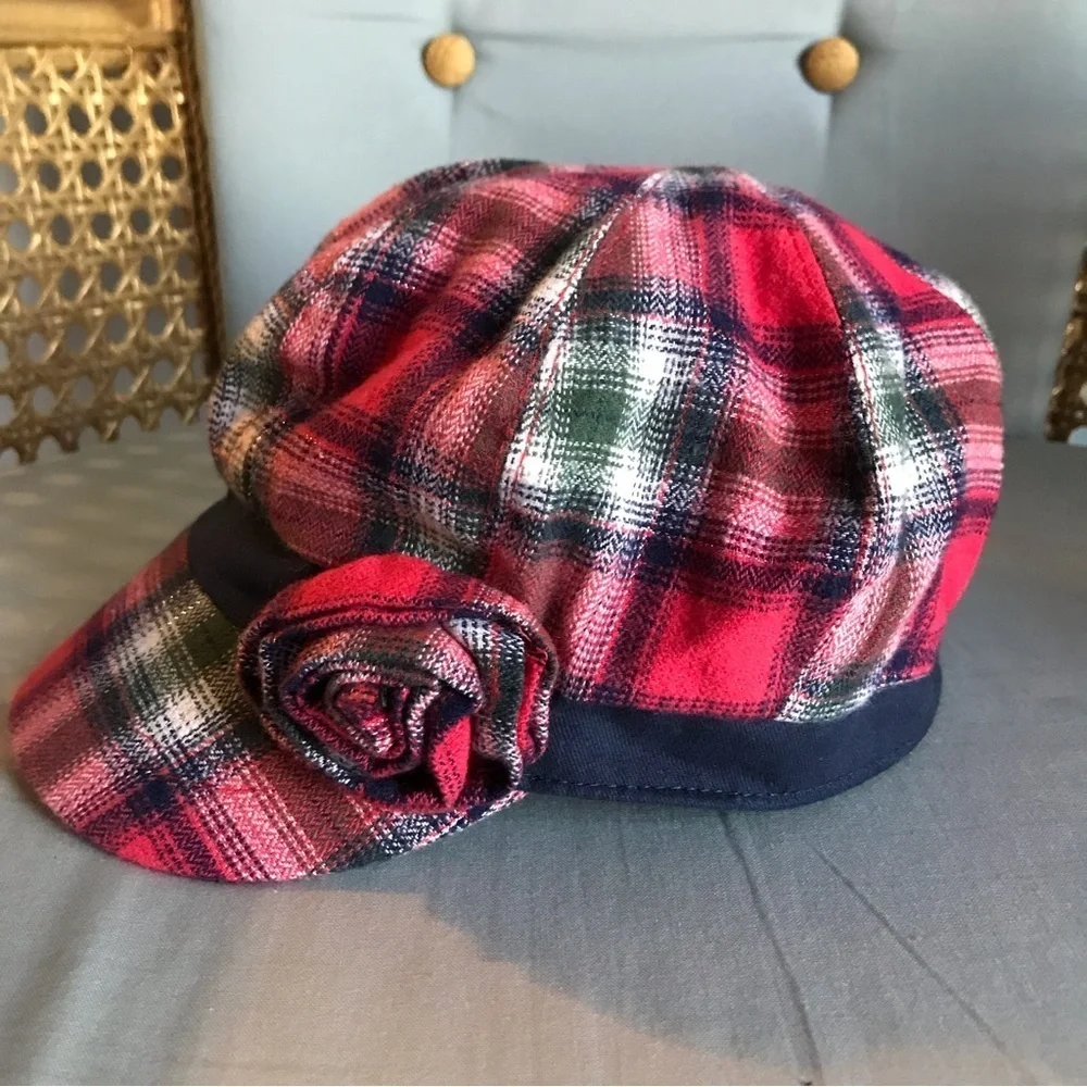Justice plaid girls hat, Navy blue with reddish, green, silver, rosette in front